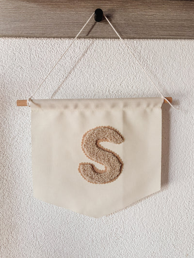 Banner met teddy initiaal